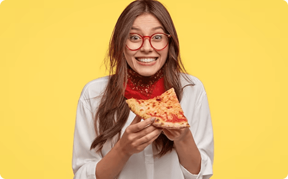 Woman eating pizza